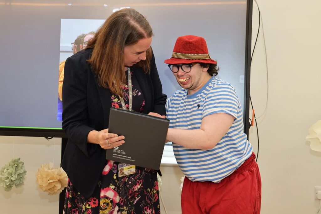 Fergus and Sasha smiling at leavers