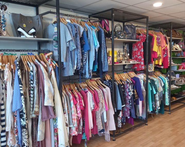 Photo of male and women's clothes at our Cheltenham charity shop