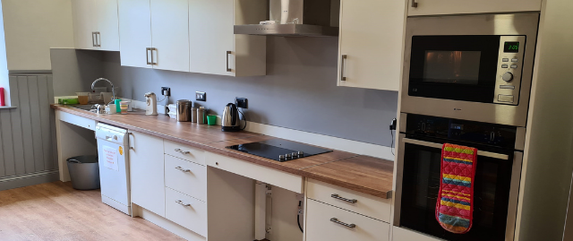 Accessible kitchen with microwave oven and sink