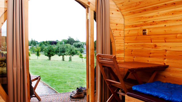 Inside of StarGlamping pod looking out on the beautiful grounds