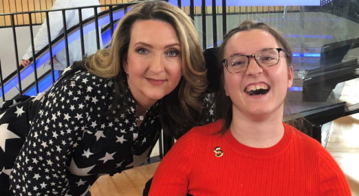 Francesca smiling next to BBC presenter Victoria Derbyshire