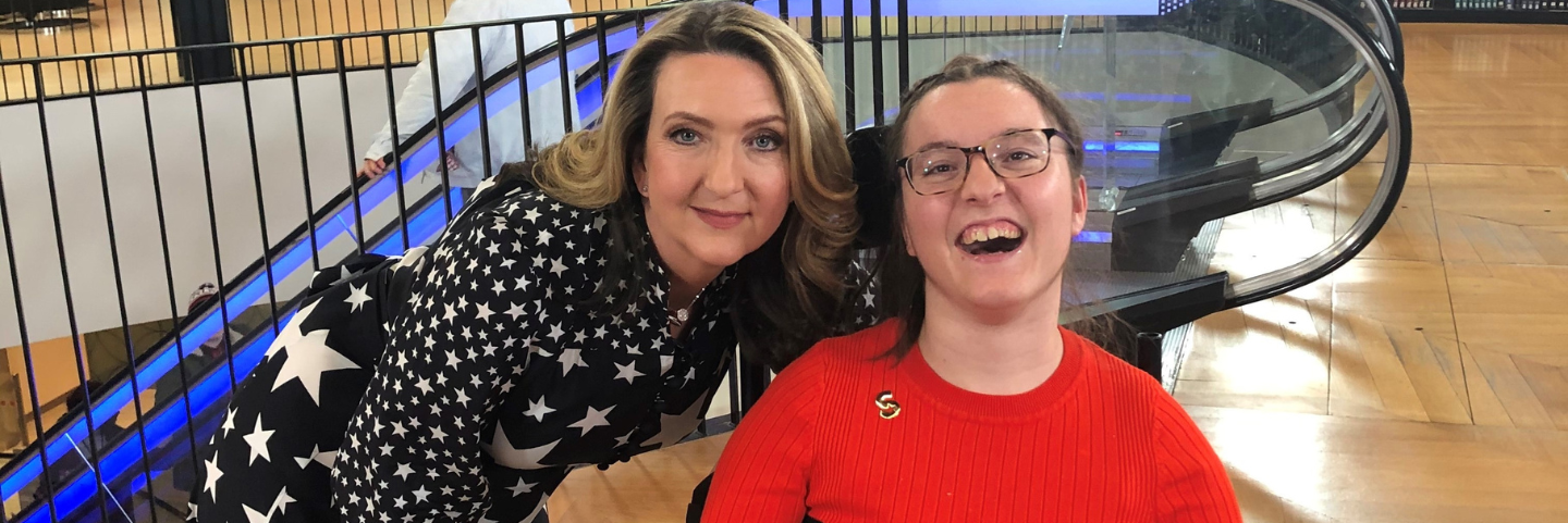 Francesca smiling next to BBC presenter Victoria Derbyshire