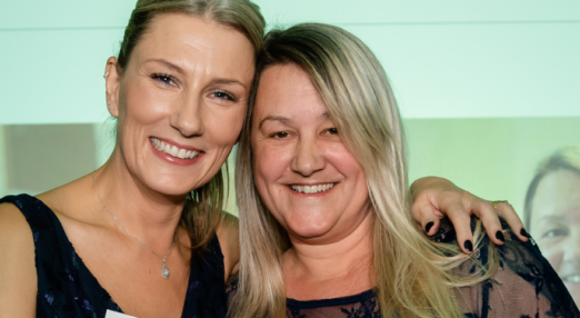 Lynette and Sarah smiling at the long-service awards