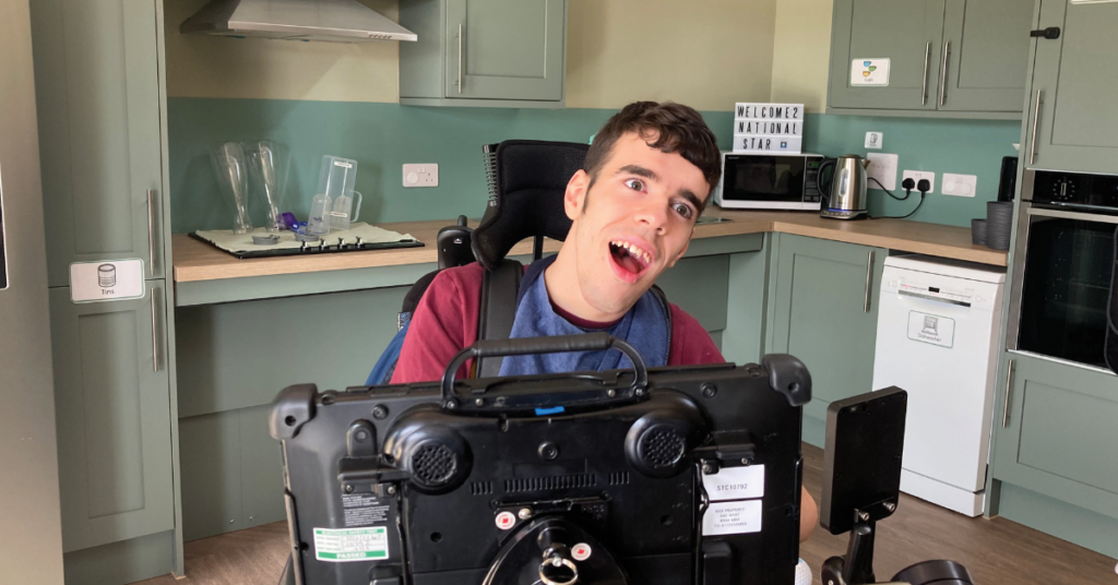 Dan smiling in the accessible kitchen