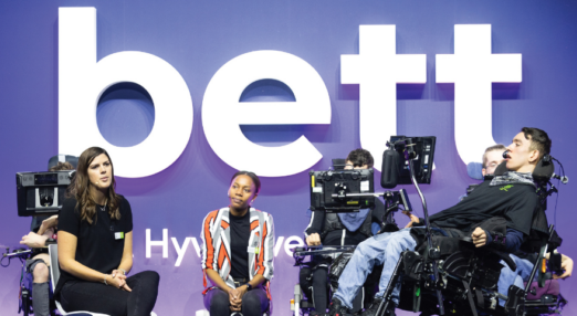Staff and students on stage at the Bett Show