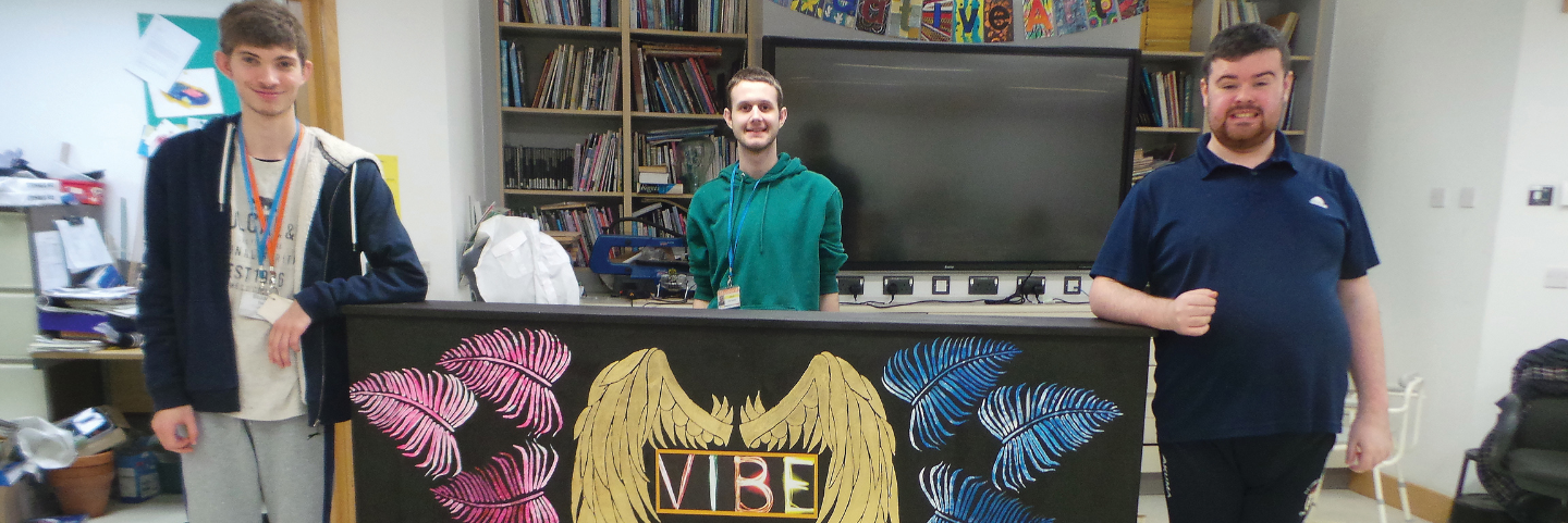 Students Ben, Jakub and Liam with the VIBE bar they designed