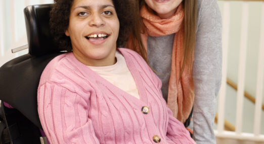 Student Amani and member of staff smiling at Eveson Centre, Hereford