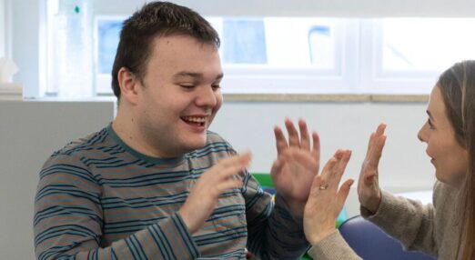 Ben and Hannah smiling in session