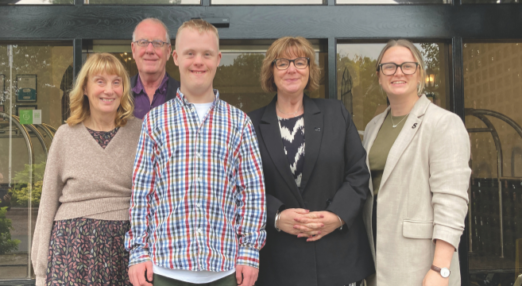 SU President Jak with family and staff at Down Syndrome UK Annual Conference