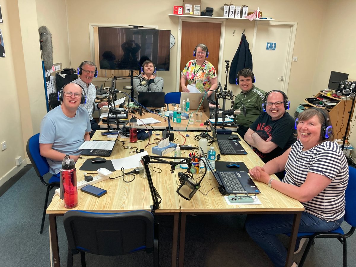 Former Hereford student Louis with group at Echo Radio